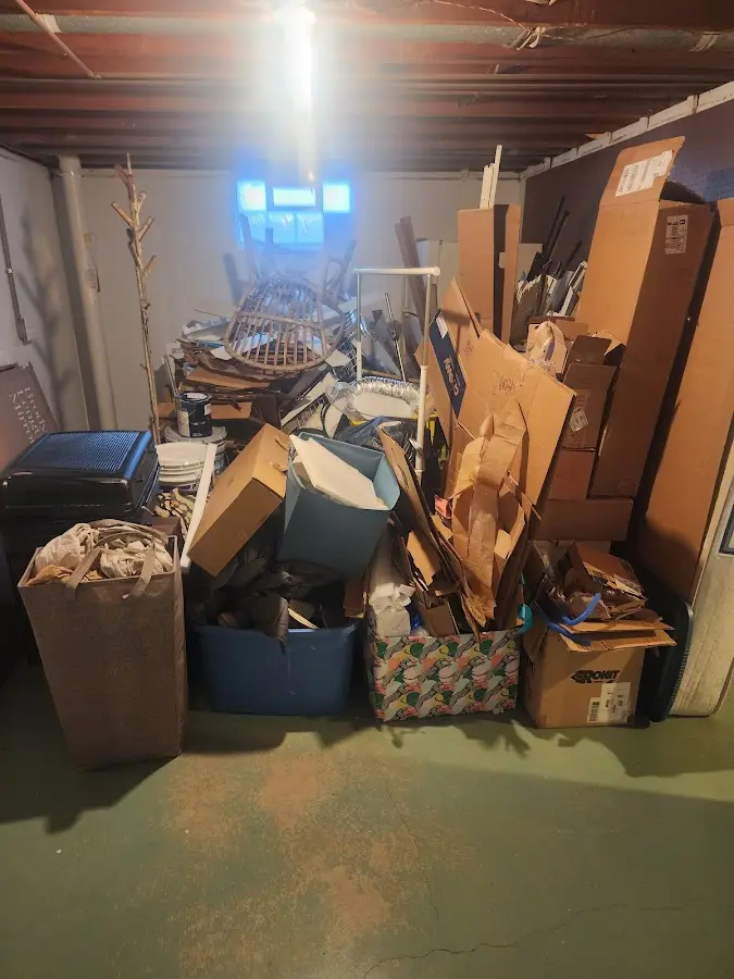 Roll-off dumpster container at job site for Yard Waste Dumpster Rental in Wamego